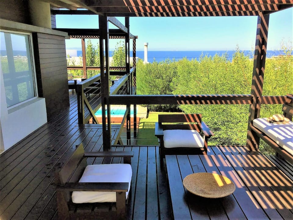 Natural landscape, Balcony/Terrace, Seating area, Dining area, Pool view, Sea view