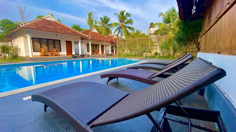 Property building, Pool view, Swimming pool, sunbed