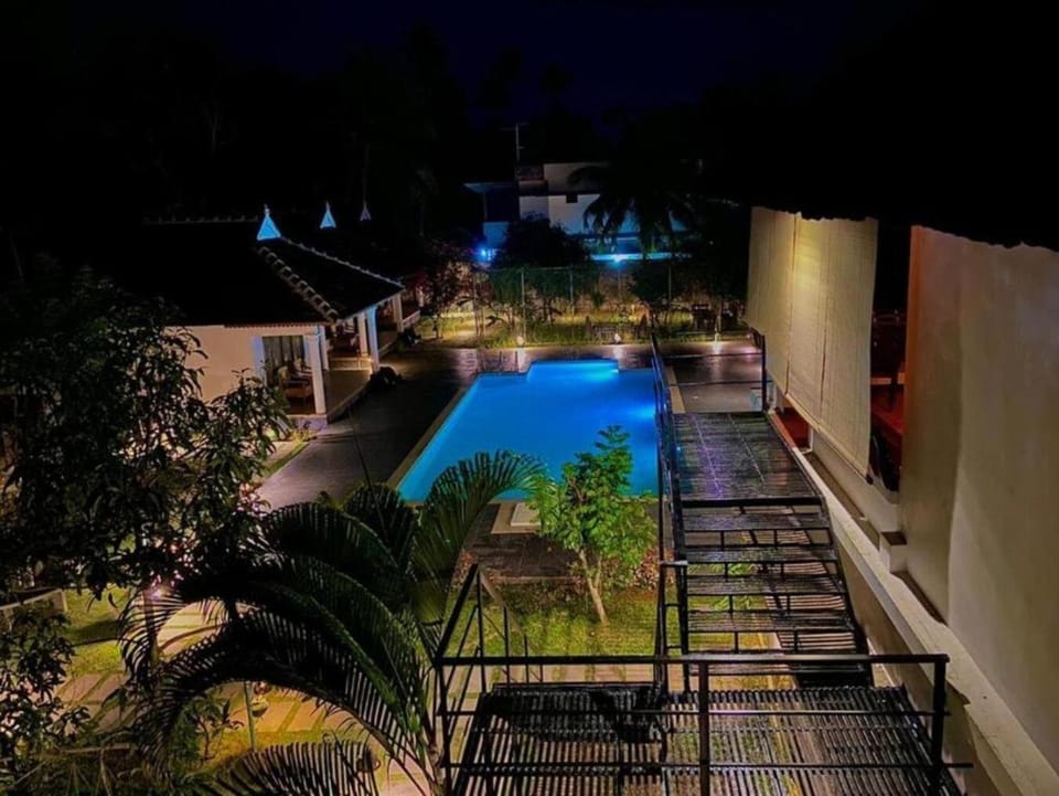 Property building, Night, Swimming pool