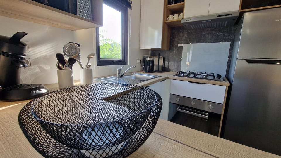 Kitchen or kitchenette, oven, stove, toaster