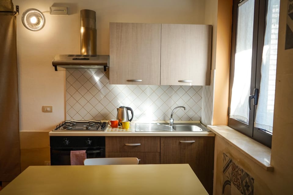 Kitchen or kitchenette, stove
