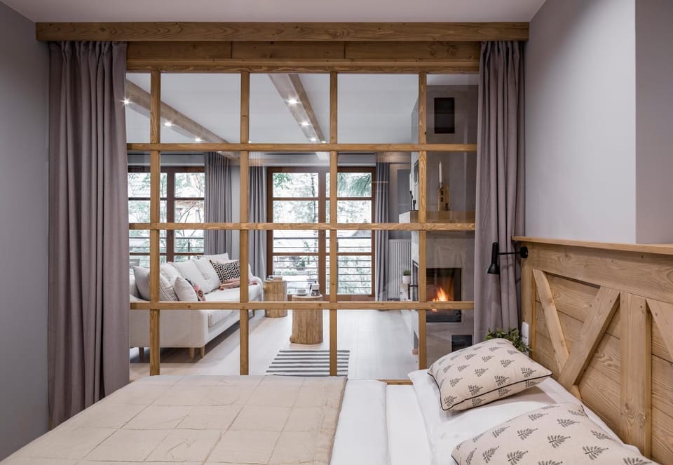 Bed, Living room, Seating area, Bedroom
