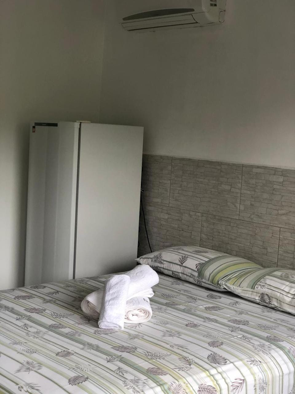 Photo of the whole room, Bedroom, towels, wardrobe, air conditioner