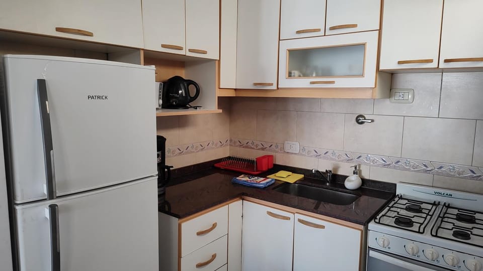 Kitchen or kitchenette, oven, stove