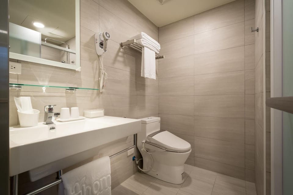 Shower, Toilet, Bathroom, bidet, hair dryier, towels