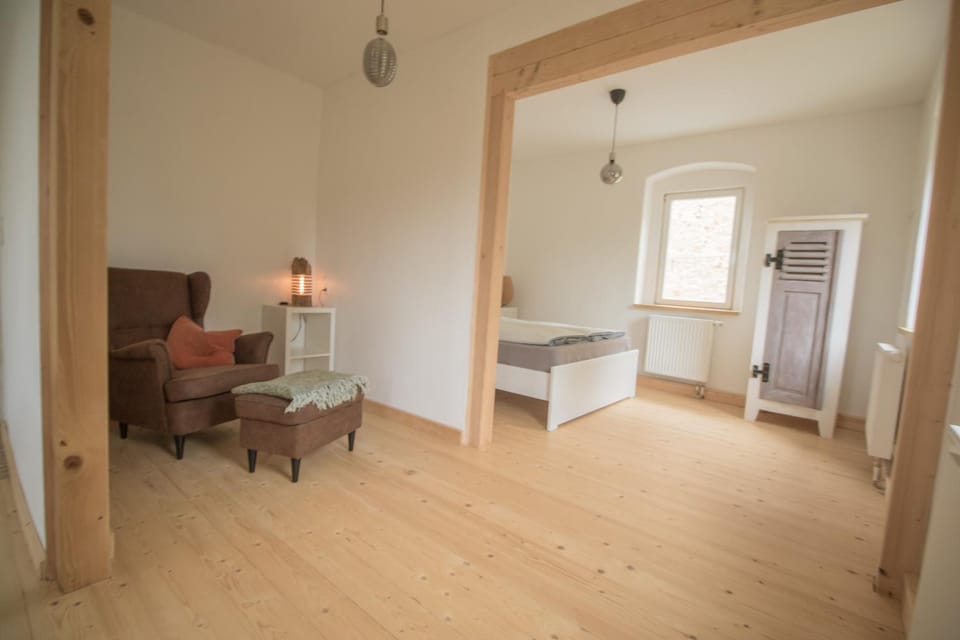 Bed, Seating area, Bedroom