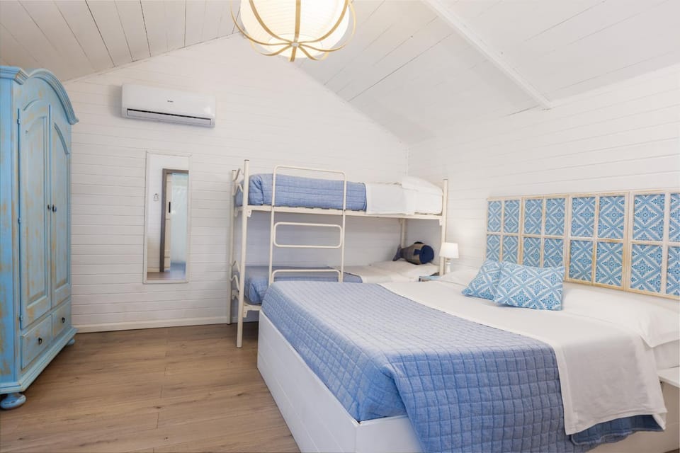 Bed, bunk bed, wardrobe, air conditioner