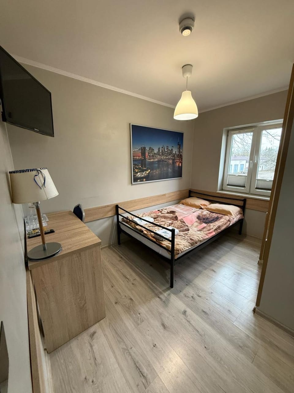 Bed, towels, wardrobe