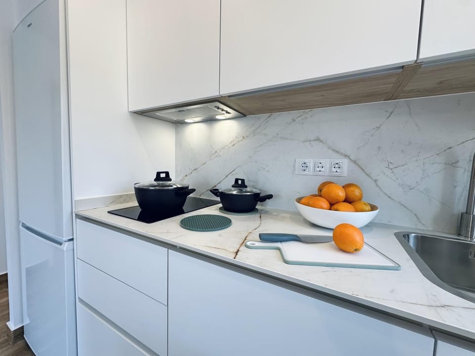 Kitchen or kitchenette, stove