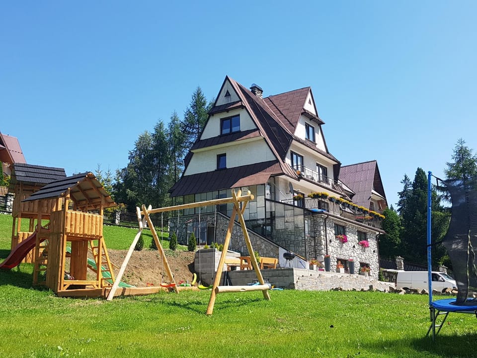 Property building, Day, Natural landscape, Children play ground