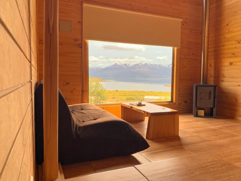 Property building, Living room, Seating area, Mountain view