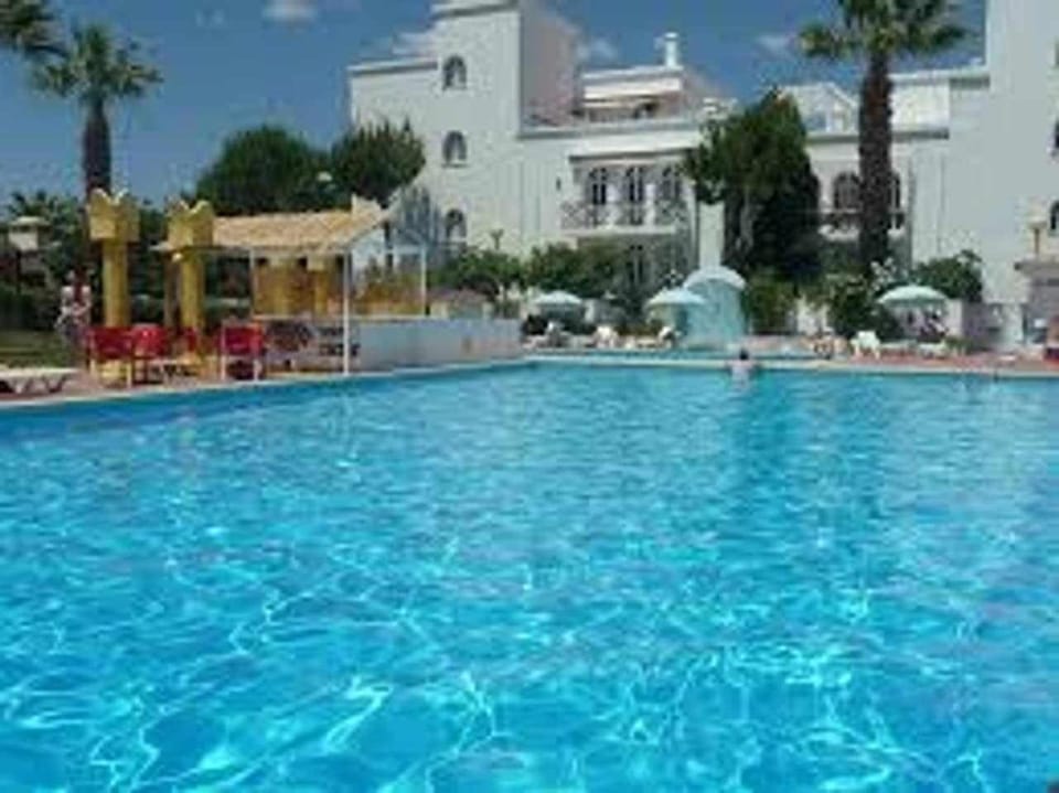 Small cozy flat, by the pool. House in Tavira