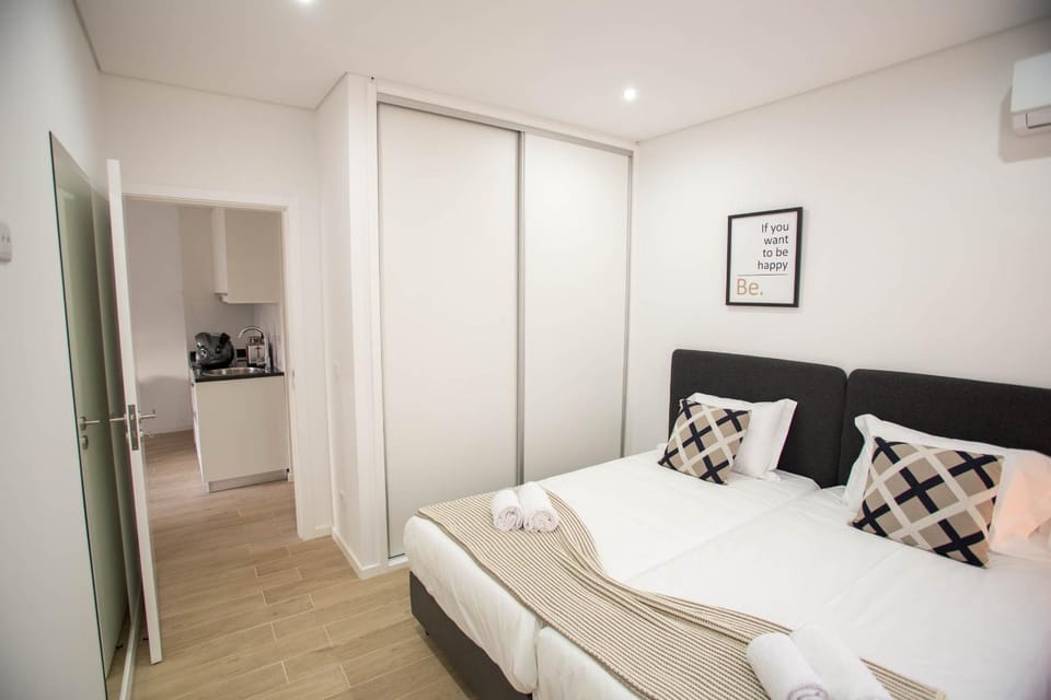 Bed, Decorative detail, Bedroom, towels, wardrobe, air conditioner