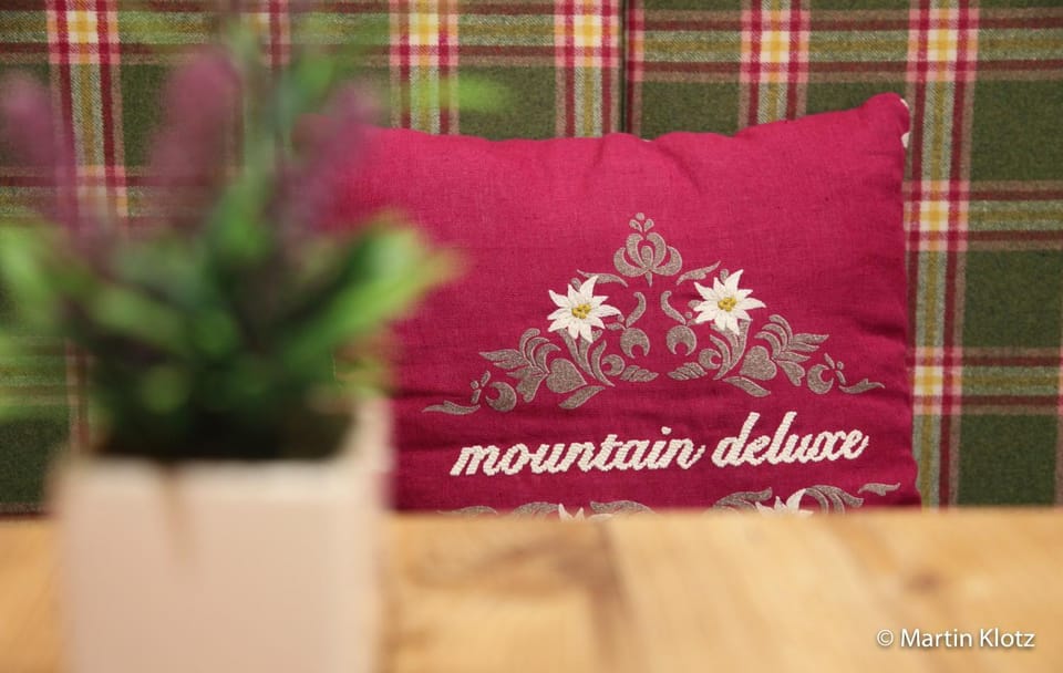 Day, People, Property logo or sign, Winter, Children play ground, Darts, Garden, Ski School, Skiing, Balcony/Terrace, Lobby or reception, Other, Decorative detail, Decorative detail, Cycling, Logo/Certificate/Sign, Autumn, Text overlay, young children, older children, group of guests, Family