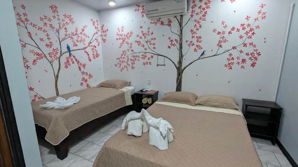 Bed, Photo of the whole room, Bedroom, towels, air conditioner
