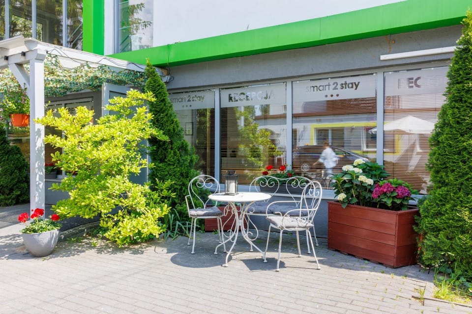 Property building, Patio, Facade/entrance, Spring, Day, Garden, Lobby or reception