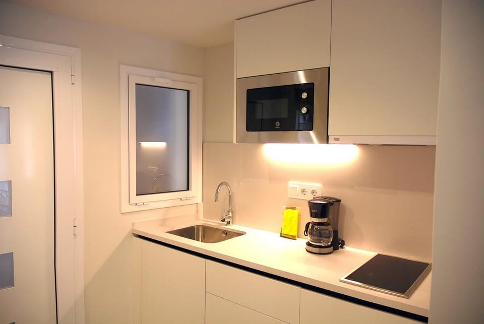 Kitchen or kitchenette, stove