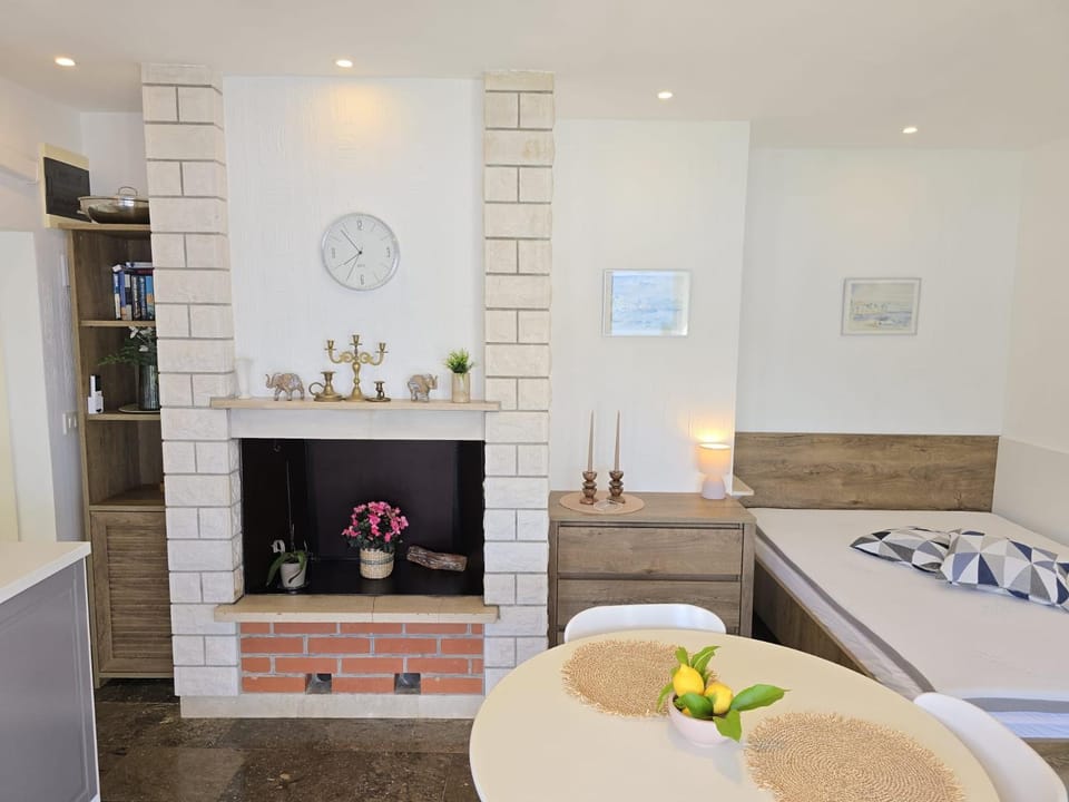 Bed, Living room, Seating area, Bedroom