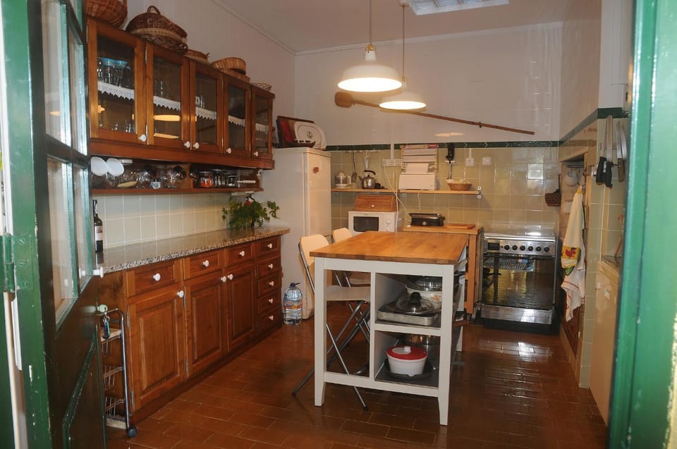 Kitchen or kitchenette, dishwasher, oven, stove, toaster