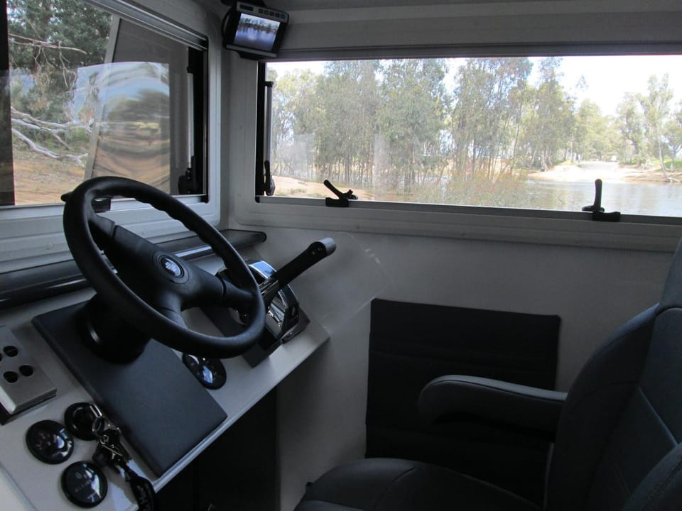 Moama on Murray Houseboats Docked boat in Echuca