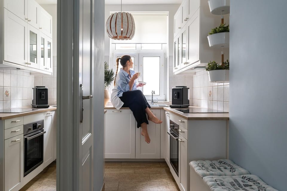 Kitchen or kitchenette, dishwasher, oven, stove
