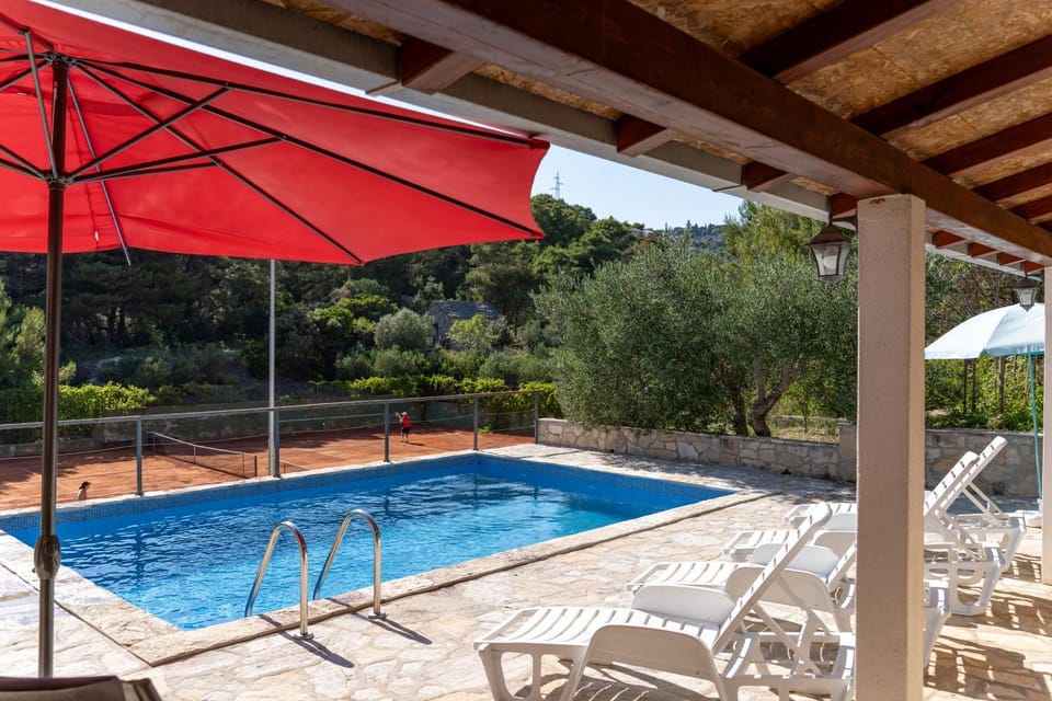 Patio, Day, Natural landscape, Pool view, Swimming pool, sunbed