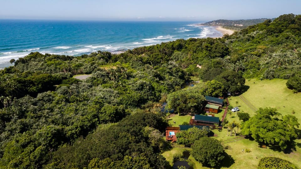 Property building, Natural landscape, Bird's eye view, Garden, Beach, Sea view