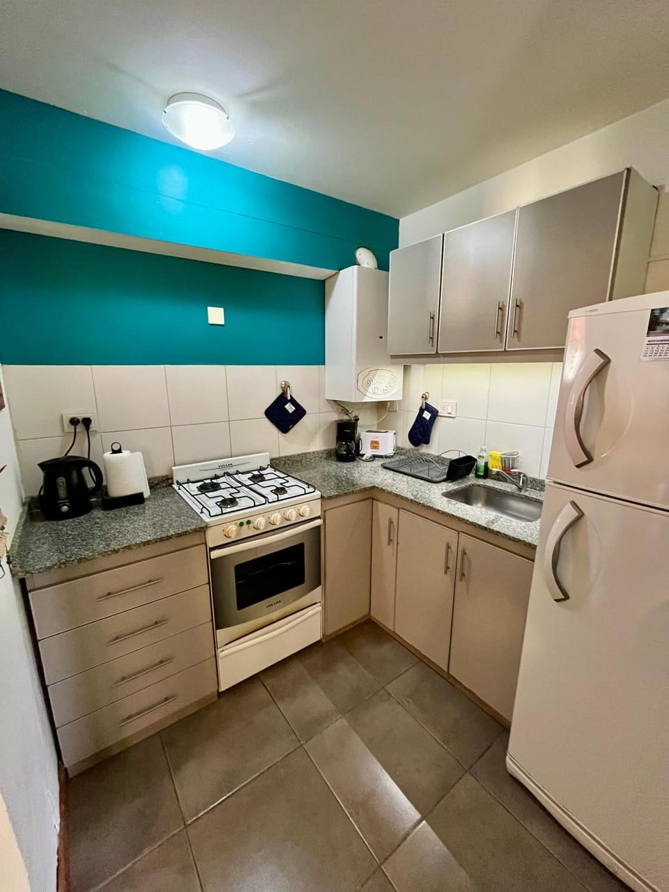 Kitchen or kitchenette, oven, toaster