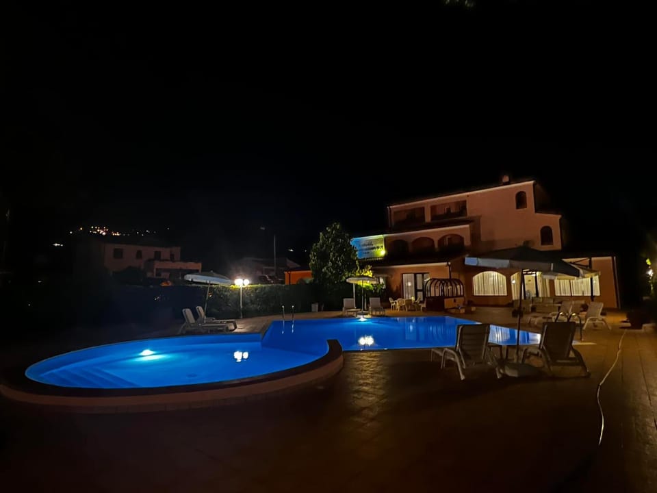 Property building, Night, Pool view, Swimming pool
