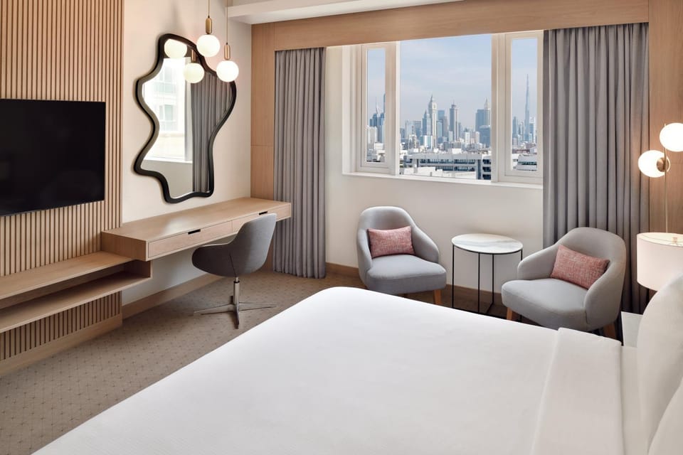 Nearby landmark, Bed, TV and multimedia, Living room, Photo of the whole room, Seating area, Bedroom