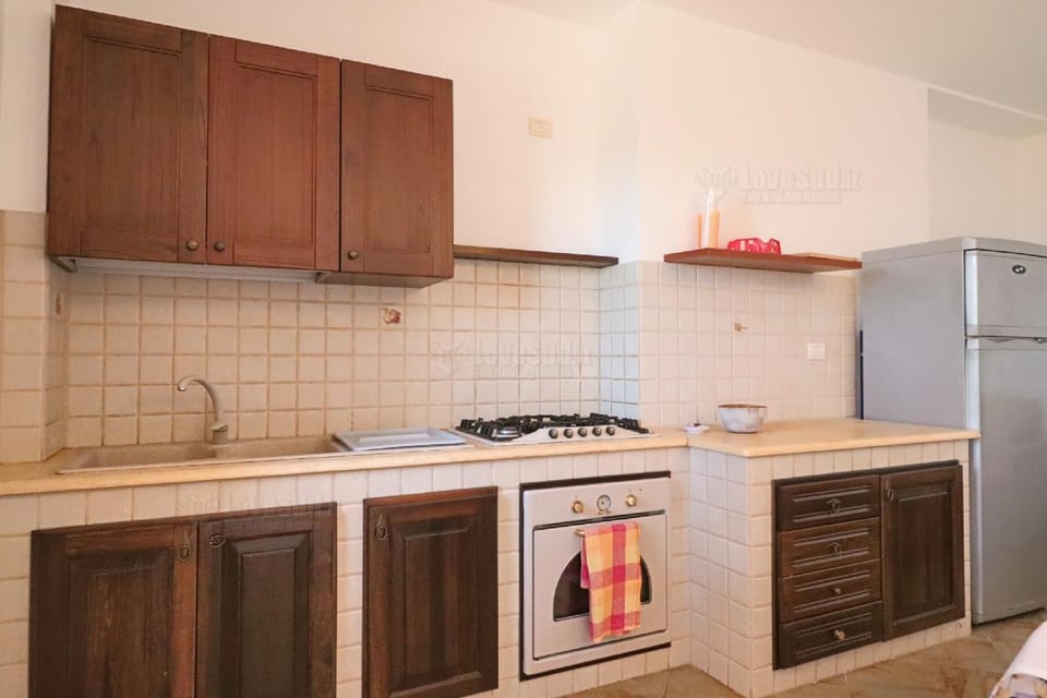 Kitchen or kitchenette, oven, stove
