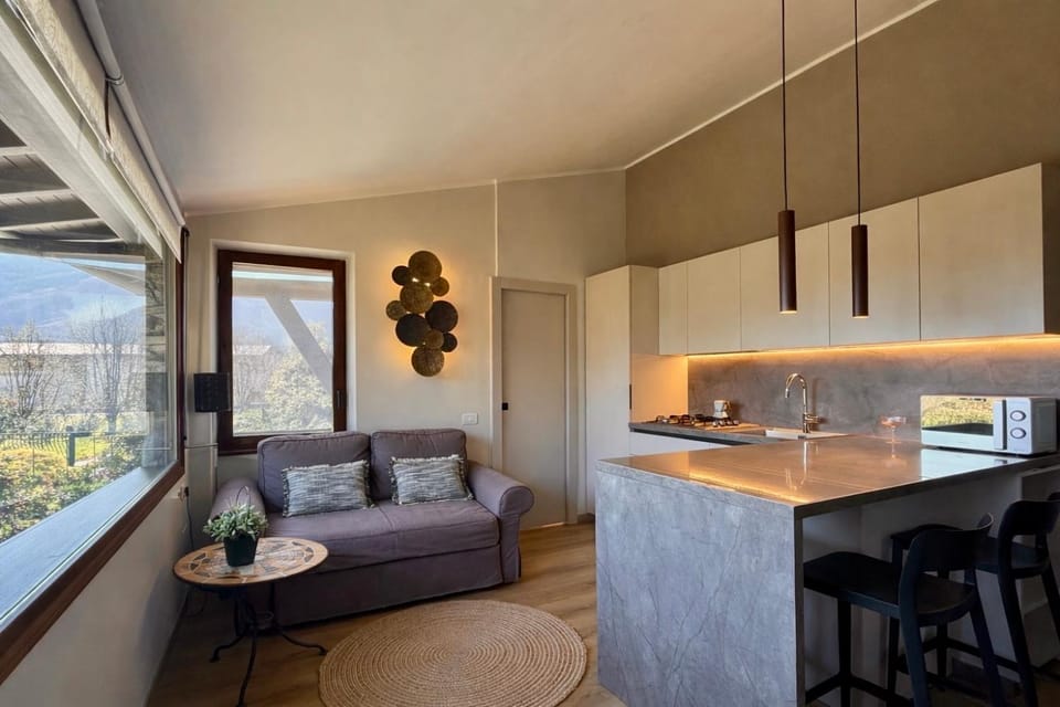 Kitchen or kitchenette, Living room, Seating area, Dining area, Lake view