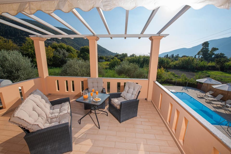 View (from property/room), Balcony/Terrace, Seating area, Swimming pool