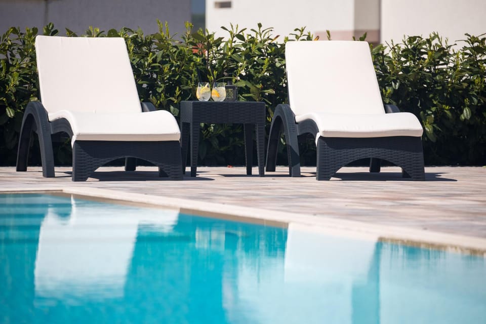 Swimming pool, sunbed