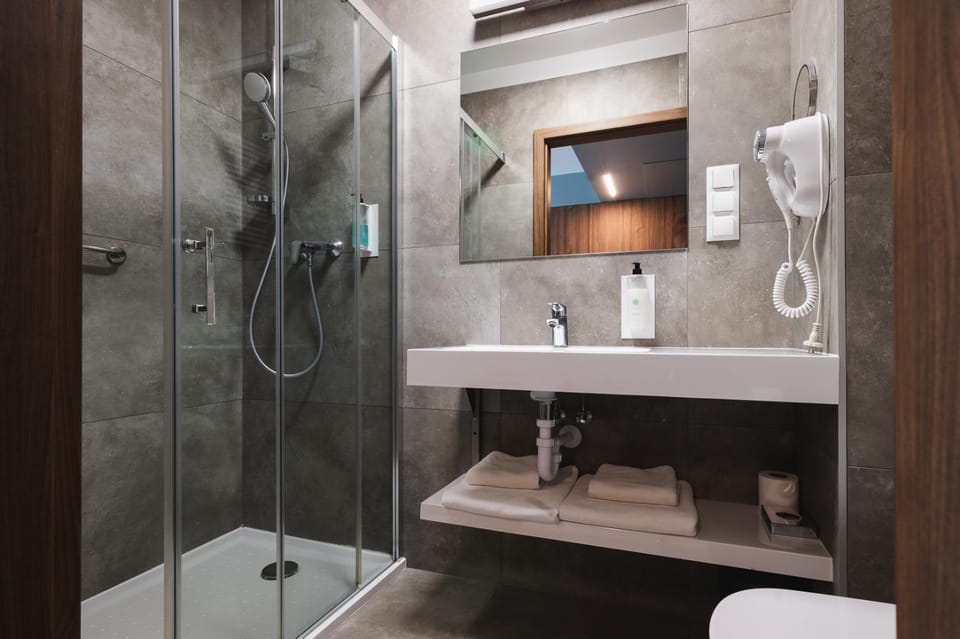 Bathroom, hair dryier, towels