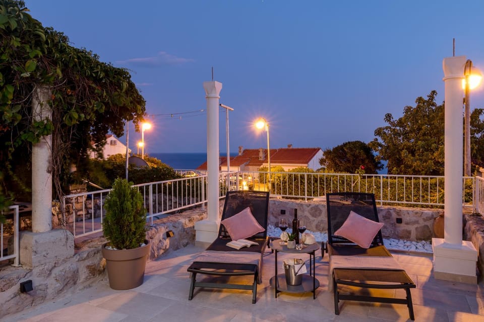 Patio, Balcony/Terrace, Seating area, Sea view, Street view, Sunset