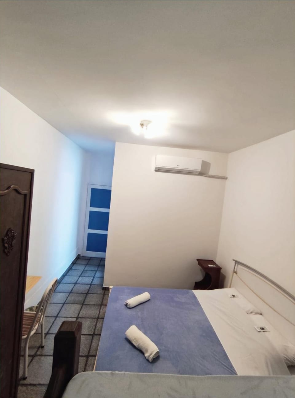 Bed, Bathroom, Photo of the whole room, Bedroom, locker, towels, air conditioner