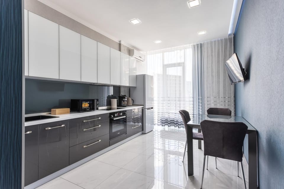 Coffee/tea facilities, Kitchen or kitchenette, Seating area, Dining area, oven, stove