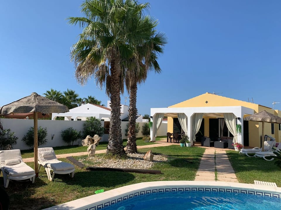 Property building, Living room, Swimming pool