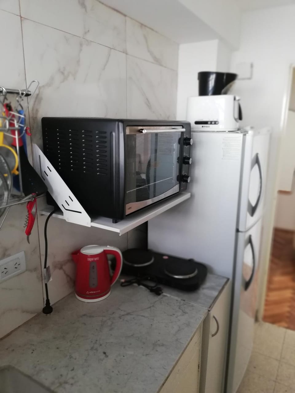 Kitchen or kitchenette, oven