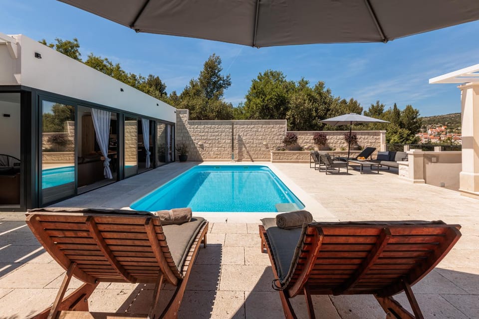 Villa TM with private heated pool, poolhouse & private garage House in Split-Dalmatia County