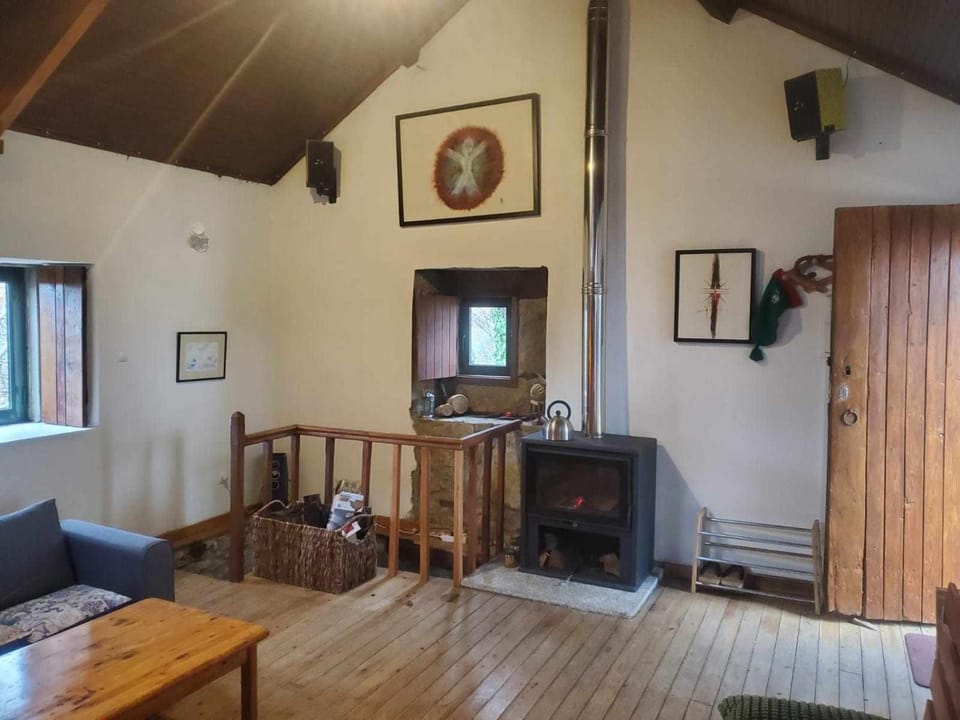 Property building, Living room, Seating area, Bedroom, flat iron