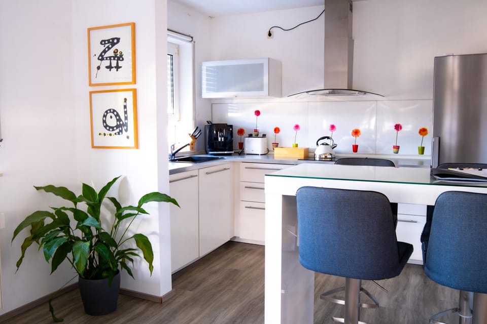 Dining area, dishwasher, toaster, kitchen