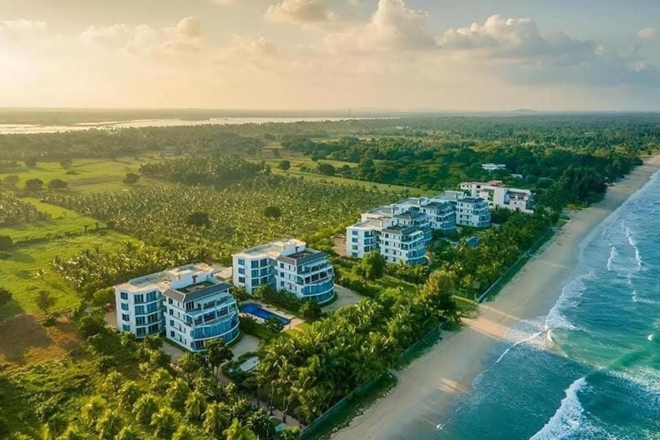 Property building, Nearby landmark, Day, Natural landscape, Bird's eye view, Beach, Sea view