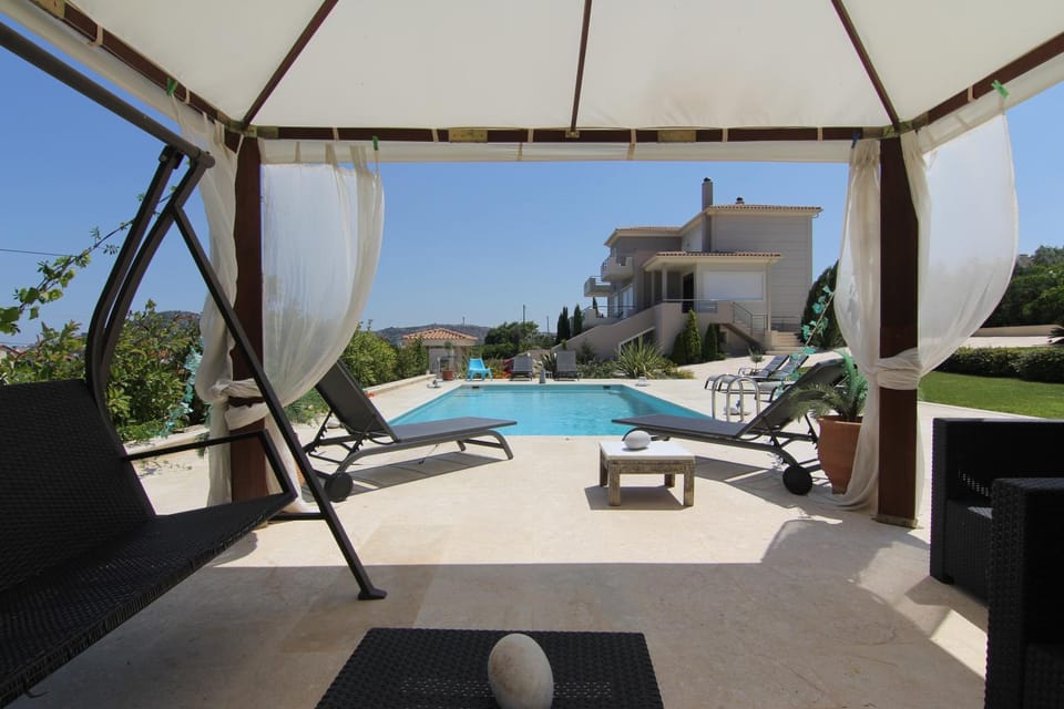 Facade/entrance, Day, Summer, Photo of the whole room, Decorative detail, On site, Garden view, Mountain view, Pool view, Sea view, Swimming pool, sunbed
