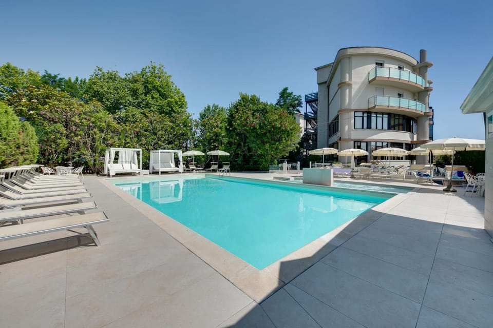 Property building, Pool view, Swimming pool, sunbed