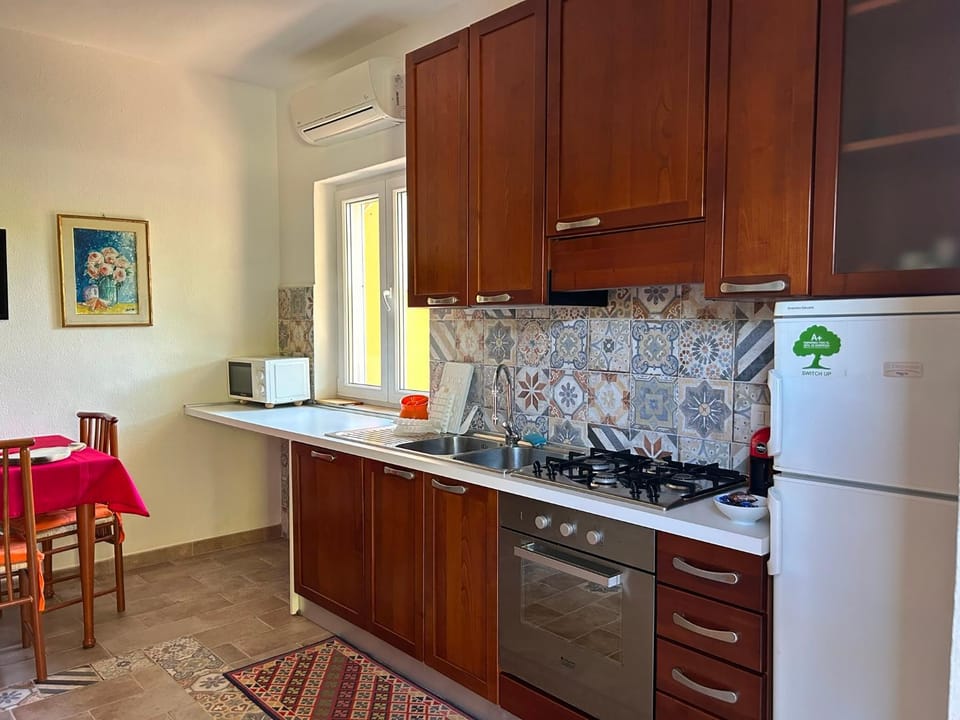 Kitchen or kitchenette, stove