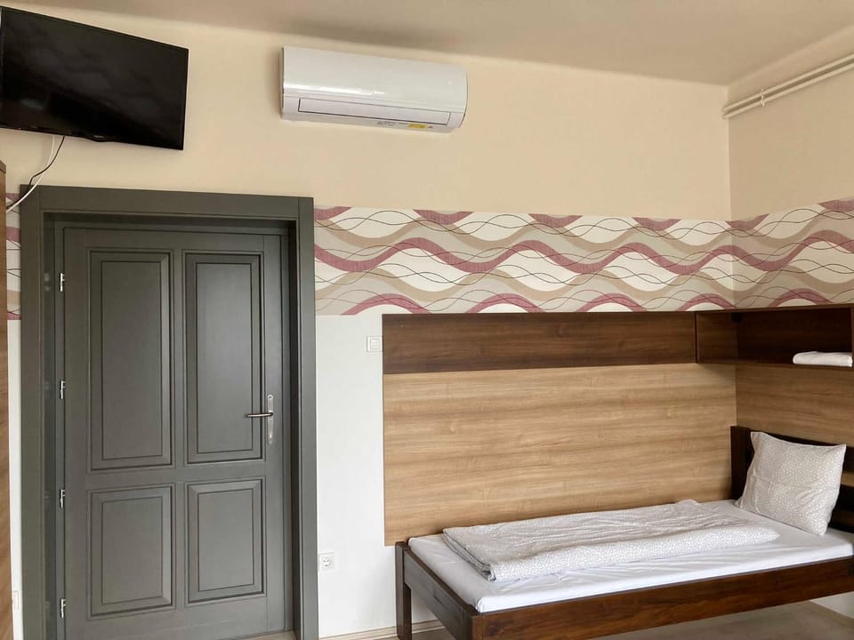 Bed, air conditioner