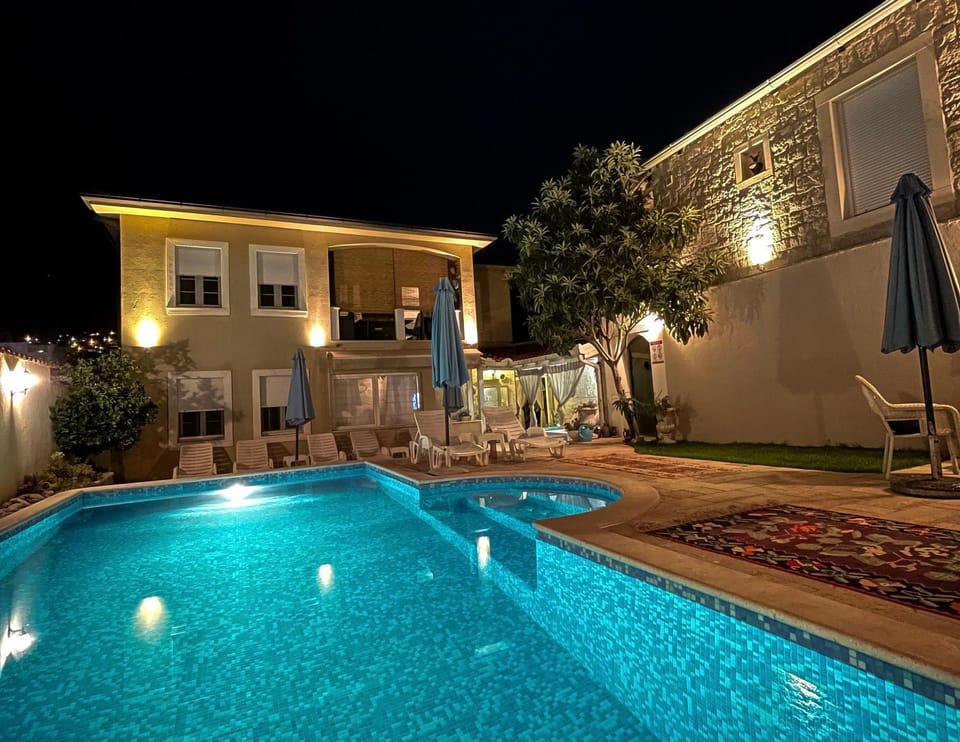 Property building, Night, Swimming pool