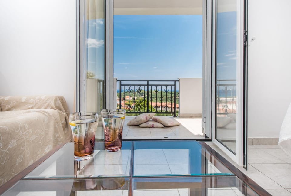 Bird's eye view, Living room, Seating area, Dining area, Sea view